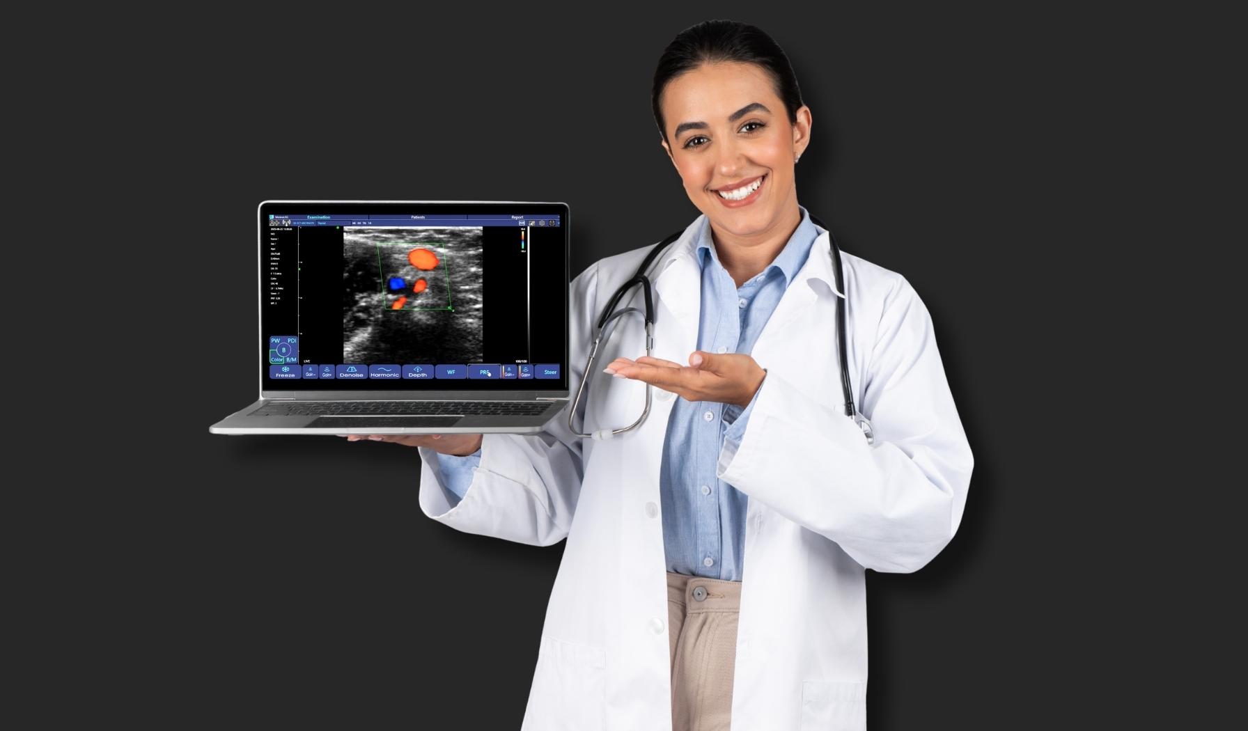 Doctor holding a laptop with the Sono Mobile™ application running, using wireless ultrasound imaging for point-of-care diagnostics in a modern clinical setting.
